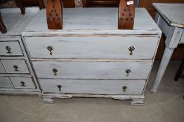 A 'shabby chic' chest of three drawers. Width approx. 90cm