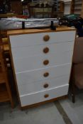 A vintage sapele and laminate 6 drawer bedroom chest in the Schreiber style
