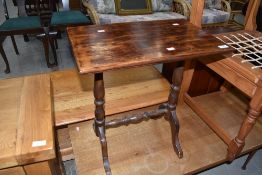 A Victorian style stained frame occasional table on turned frame