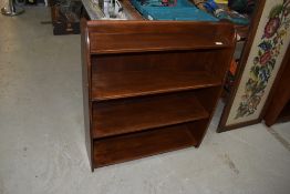 A mid 20th Century stained frame low bookshelf, width approx. 76cm