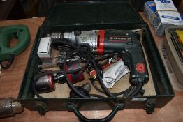 A Metabo cordless drill in metal case