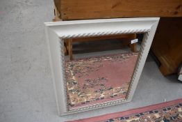 A modern mirror, approx. 53 x 65cm