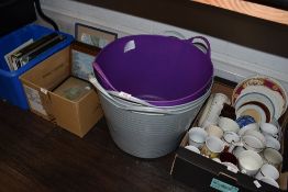 Four plastic flexible tubs with handles.