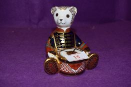 A Royal Crown Derby paperweight Drummer Bear with a Gold stopper
