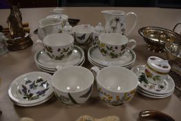 A collection of Portmeirion cups,plates jugs and saucers and a Royal Worcester trinket pot.
