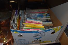A box full of O/S maps, books and similar ephemera.