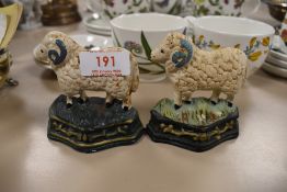 Two vintage style ram door stops.