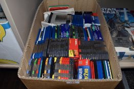 A box full of zip and floppy discs.