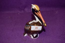 A Royal Crown Derby paperweight Brown Pelican with gold stopper