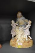 A large bisque figure base of Jesus and two children impressed 1068 to reverse
