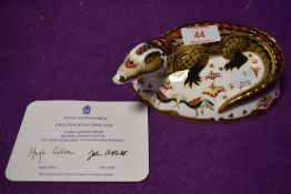 A Royal Crown Derby paperweight Crocodile with gold stopper and certificate