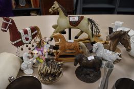 A selection of horse figures.