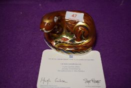 A Royal Crown Derby paperweight Otter with gold stopper and certificate