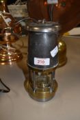 A vintage safety lamp 'the wolf safety lamp Co Wm Maurice Ltd Sheffield, cracks to glass but fully