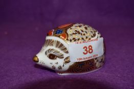 A Royal Crown Derby paperweight Bramble Hedgehog with gold stopper