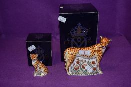 Two Royal Crown Derby paperweights. Leopardess and Leopard Cub, both boxed and with gold stoppers