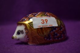 A Royal Crown Derby paperweight Orchard Hedgehog with gold stopper