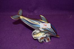 A Royal Crown Derby paperweights Striped Dolphin, with gold stoppers
