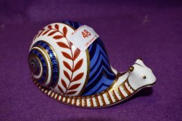 A Royal Crown Derby paperweight Snail with silver stopper