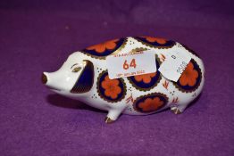 A Royal Crown Derby paperweight Pig, with silver stopper