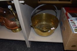 A vintage brass jam pan.