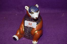 A Royal Crown Derby paperweight Honey Bear with gold stopper