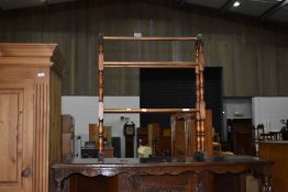 A traditional Victorian style towel rail, width approx. 63cm