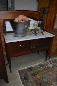 An Edwardian mahogany and inlaid wash stand having grey marble top and back, width approx. 107cm