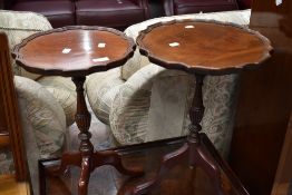 A matched pair of reproduction wine tables, diameter approx. 36 and 30cm