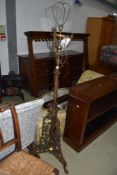 A Victorian brass standard lamp