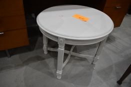 A painted oval coffee table, in the Adams style, approx. 87 x 59cm