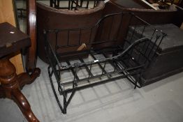 A Victorian style metal travel cot