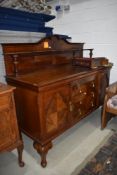 A late 19th/early 20th Century mahogany ledge back sideboard, width approx. 168cm