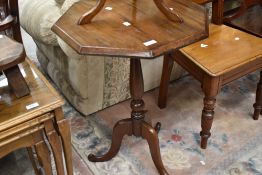 A traditional stained frame octagonal occasional table of triple splay legs, width approx. 51cm
