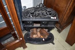 A reproduction French style cast fire