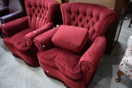 A pair of modern dralon armchairs