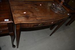A 19th Century mahogany side table with shallow frieze drawer, width approx. 91cm, top heavily