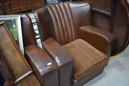 An Art Deco brown three piece suite