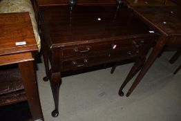 An early 20th Century mahogany cutlery canteen, with contents