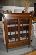 An early 20th Century mahogany display cabinet with lower drawer, dimensions approx. Width 99cm