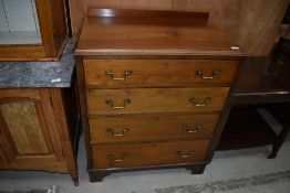 An early 20th Century mahogany chest of four long drawers, width approx. 77cm