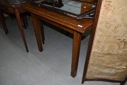 An early 20th Century oak drawer leaf table