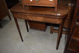 A 19th century mahogany fold over tea table, width approx. 87cm