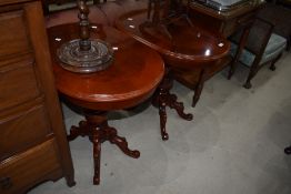 A pair of modern oval occasional tables