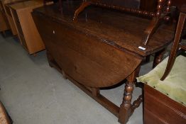 A period oak gateleg table, width approx. 140cm