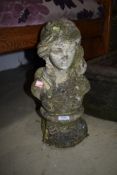 A concrete garden ornament, bust of a lady on plinth