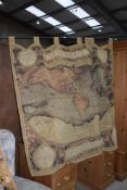 A reproduction tapestry wall hanging depicting world map, with hanger, width approx. 210cm