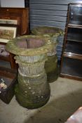 A pair of sandstone urns, originally from Grizedale Hall, purchased at the dispersal sale by the cur