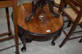 An early to mid 20th Century circular coffee table, diameter approx. 60cm