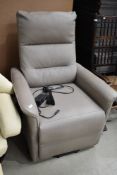 A modern beige electric recliner chair